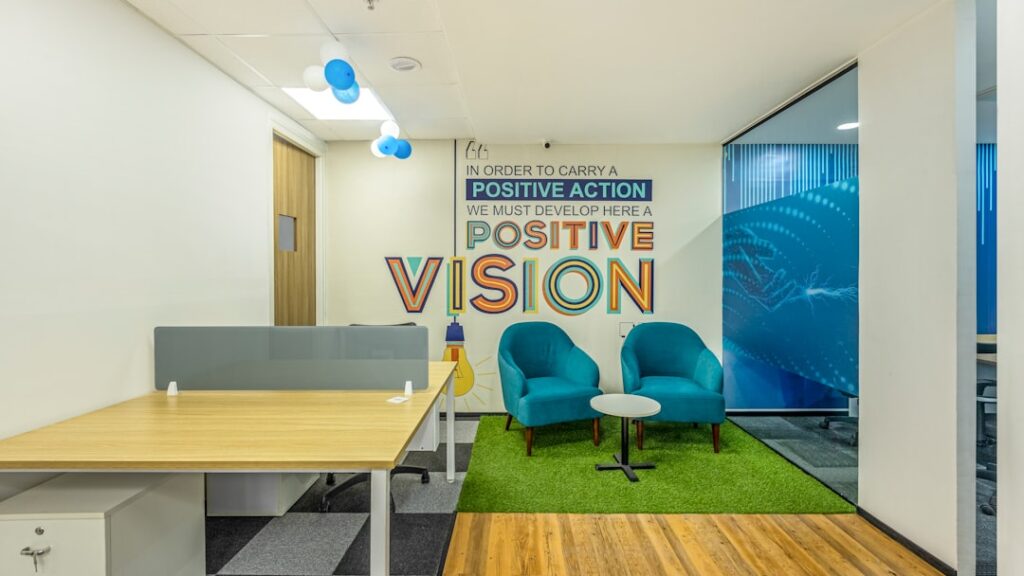 Professionals working in a modern sports technology and data analytics office in India