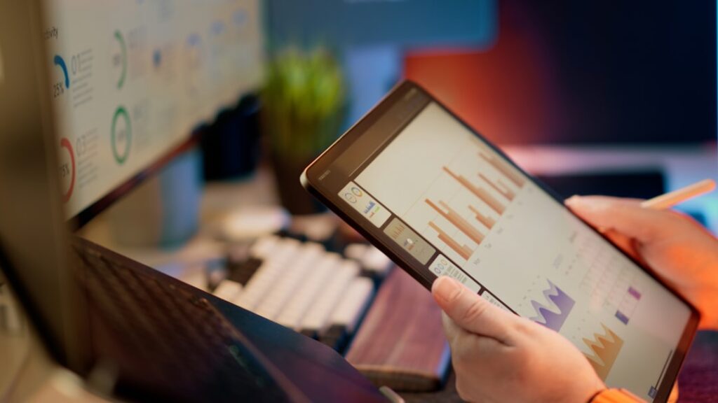 Sports data analyst analyzing athlete performance metrics for a professional team