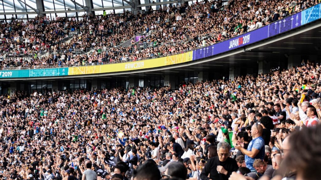 Sports management student gaining live event exposure at a stadium